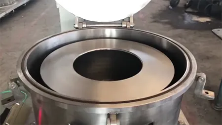 Centrífuga de descarga superior