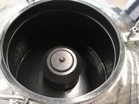 Centrífuga de descarga superior